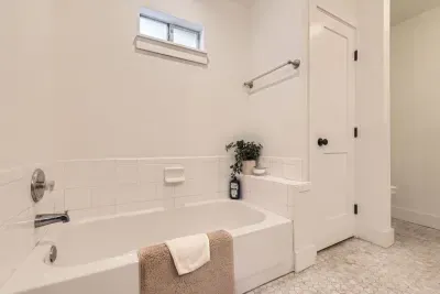 Take a relaxing soak in the tub; perfect after a long day on the go.