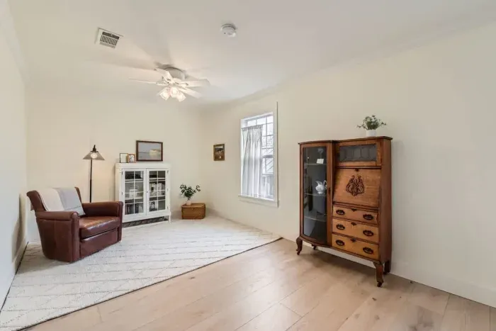 Cozy second living area with comfortable seating and a relaxed atmosphere, perfect for lounging or quiet time.