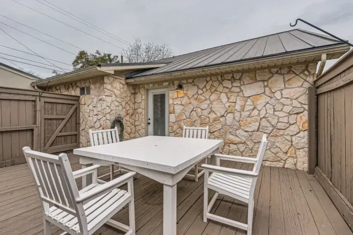 Spacious, open-air patio with room for dining, lounging, and enjoying the fresh air.