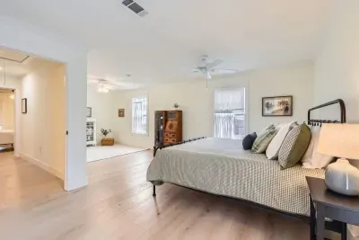Guest-friendly bedroom with a cozy vibe and ample storage space.
