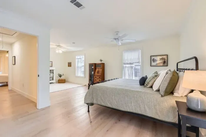 Guest-friendly bedroom with a cozy vibe and ample storage space.