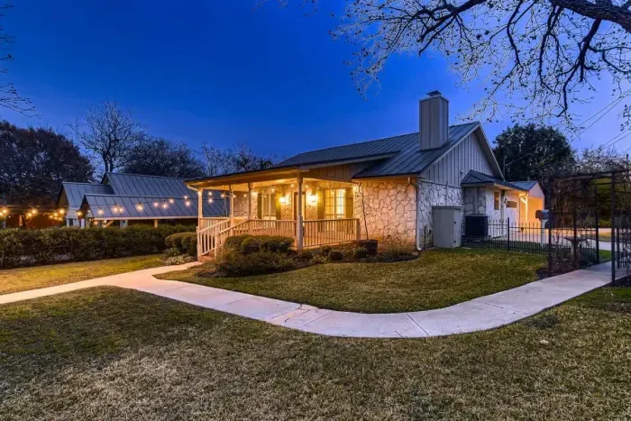 A large front lawn with plenty of space for outdoor games, picnics, or simply soaking up the sunshine.