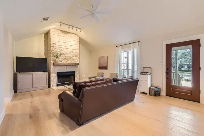 Stylish living room featuring a statement fireplace and elegant decor.