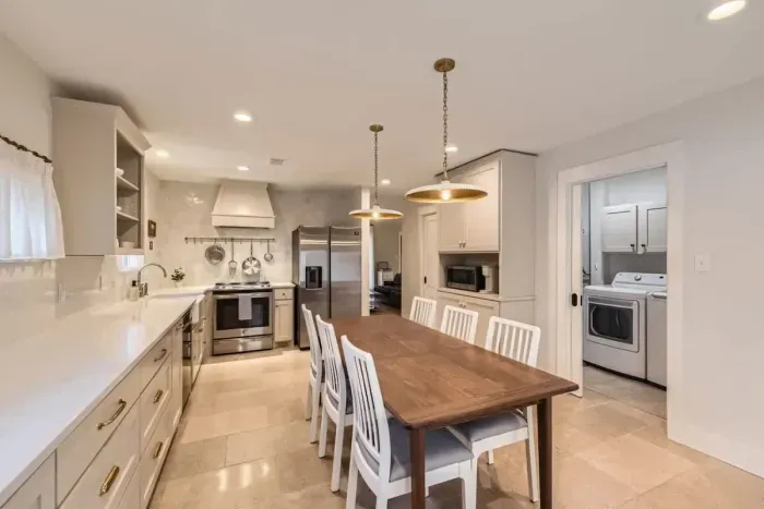 The open-concept dining area flows seamlessly from the kitchen, making group meals a breeze.