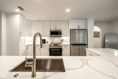 A sleek modern kitchen crafted for high-end culinary experiences.
