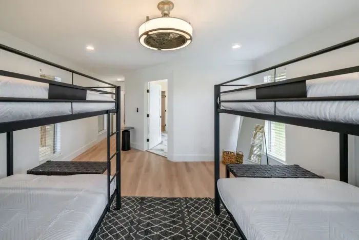 A serene and spacious guest room designed for ultimate comfort.