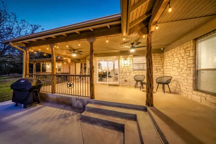 A softly lit patio that sets the stage for elevated outdoor living.