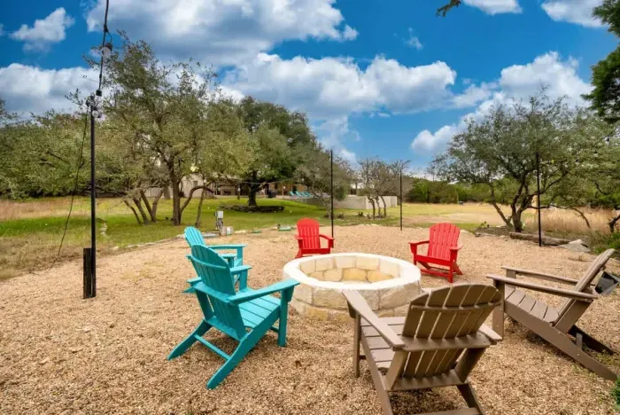A cozy backyard retreat with fireside seating for unforgettable evenings.