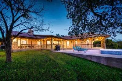 A beautifully lit backyard oasis perfect for evening gatherings.