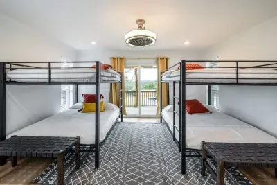 Another angle of the guest bedroom highlighting its spacious layout.