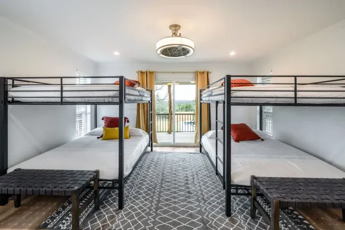 Another angle of the guest bedroom highlighting its spacious layout.