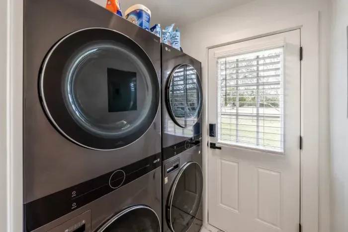 A well-appointed laundry room designed for convenience and modern living.