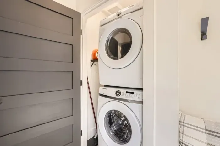 Fully equipped laundry space to refresh your clothes during your stay.