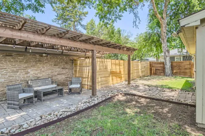 Private outdoor area with comfortable seating, ideal for relaxing or stargazing.