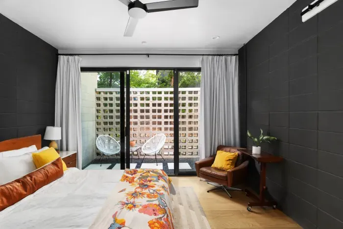 5. Bright and cheerful bedroom with a large bed and plenty of natural light.