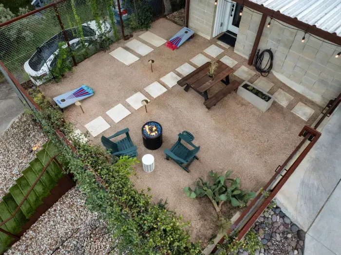 Backyard with a cozy fire pit, ideal for roasting marshmallows and enjoying the cool evening air.