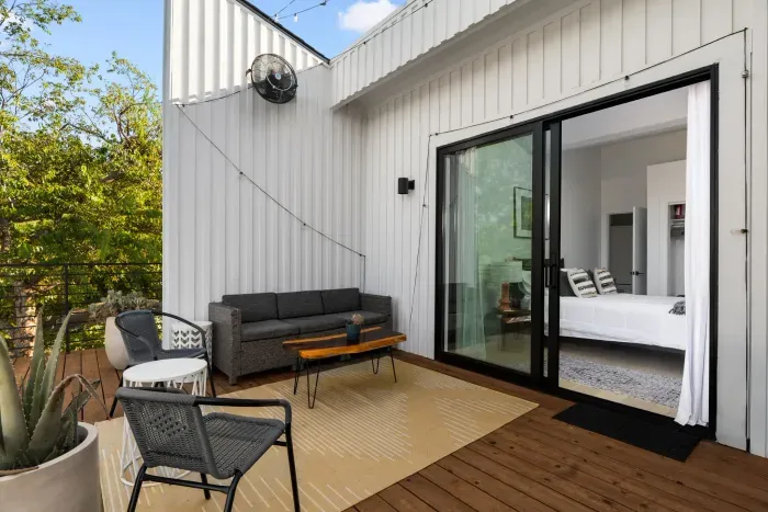 Step outside to your city balcony and take in the hustle and bustle below, with a stunning view.