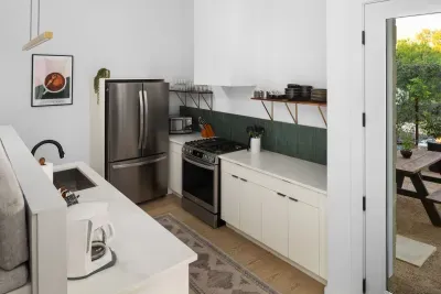 With ample counter space and quality appliances, cooking here is a pleasure.