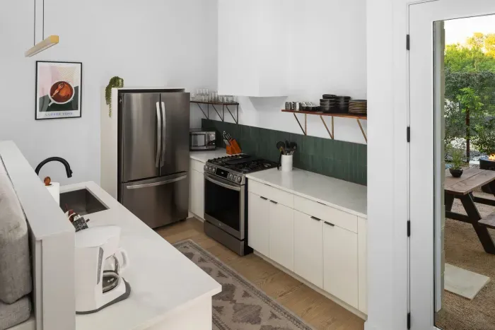 With ample counter space and quality appliances, cooking here is a pleasure.