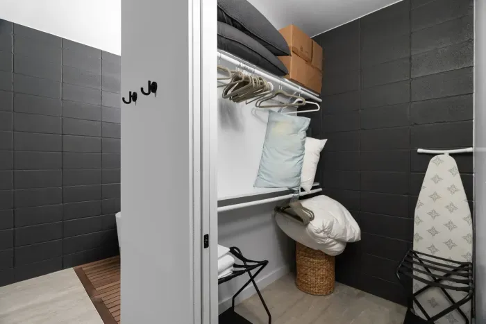 Simple yet elegant bathroom with a minimalist design and all the essentials.