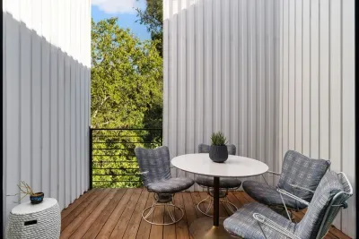 Enjoy city skyline views from your private balcony, perfect for relaxing after a day of exploring.