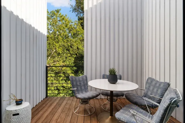 Enjoy city skyline views from your private balcony, perfect for relaxing after a day of exploring.