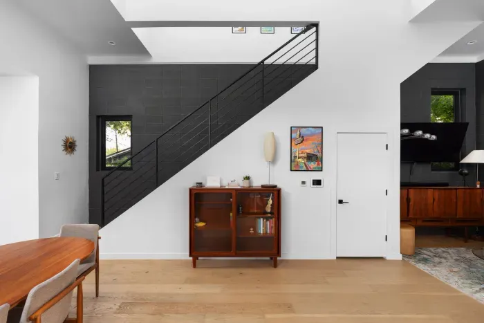 Modern living room with sleek furniture and a minimalist vibe.