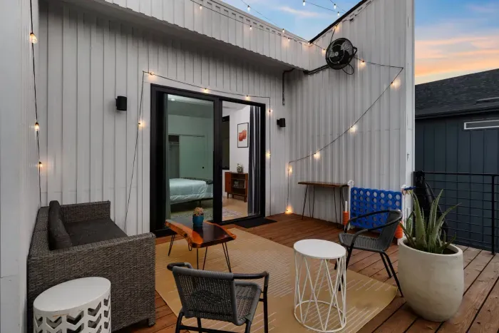 2. Modern patio with comfortable furniture, creating a stylish outdoor space for both relaxation and entertainment.