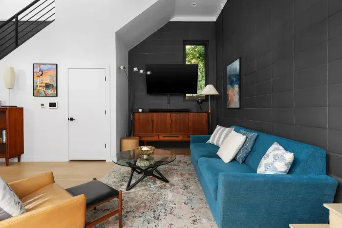 Bright and airy living space with modern furnishings and plenty of natural light.