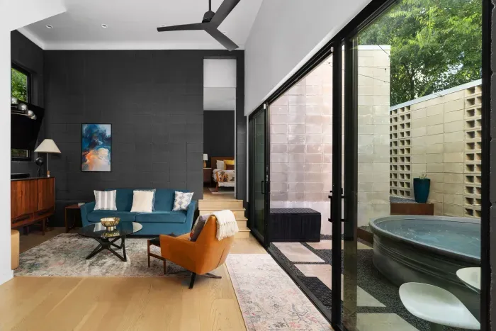 1. Spacious and bright living room with large windows and serene views.