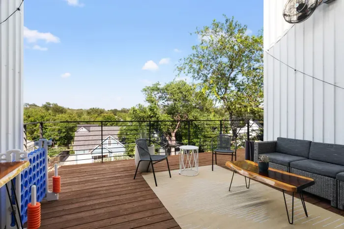 A cozy urban retreat with a balcony to enjoy the vibrant sights and sounds of the city.