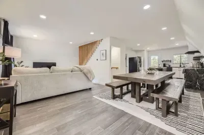 Inviting common space designed for relaxation and connection. This versatile area features comfortable seating, ample natural light, and a welcoming atmosphere, making it perfect for socializing, reading, or unwinding. Ideal for gatherings or quiet m