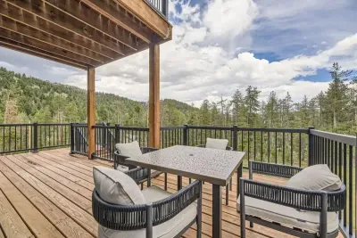 Spacious, open-air back deck perfect for outdoor dining, relaxation, and entertaining. With ample room for seating and surrounded by nature, it’s an ideal space to enjoy fresh air, sunsets, and gatherings with family and friends. A seamless extension