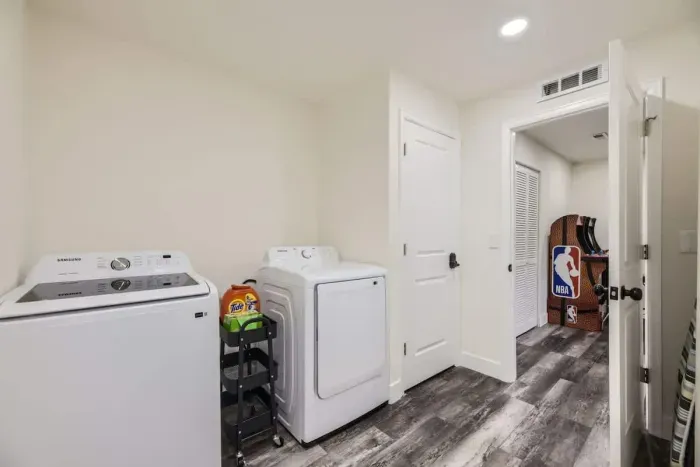 Convenient laundry area with a washer and dryer, making packing a breeze.