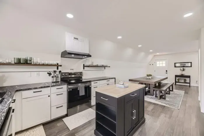 5. Functional and beautiful, this kitchen comes fully equipped with cookware, utensils, and small appliances.