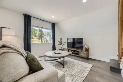 Equipped with a large TV, cozy seating, and space for everyone.