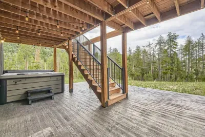 Relax and unwind on the spacious back deck, offering a perfect space for outdoor dining, lounging, or simply enjoying the view. Surrounded by nature, it’s an ideal spot for entertaining or peaceful moments in the fresh air.