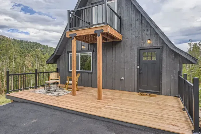 Approach the exterior front of the home, where charming details and a well-maintained yard create an inviting first impression. The thoughtful landscaping and welcoming entrance enhance the overall curb appeal, making it a warm and attractive space.