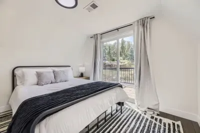 Guest-friendly bedroom with a cozy vibe and ample storage space