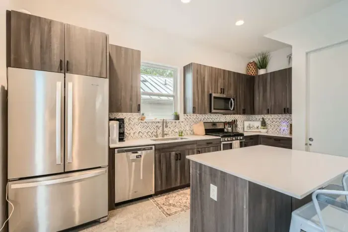 With ample counter space and quality appliances, cooking here is a pleasure.