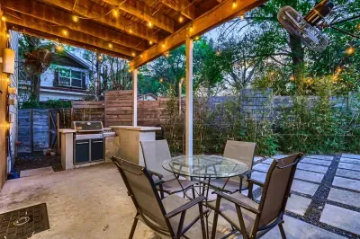 3. A charming patio illuminated with cozy, warm lighting.