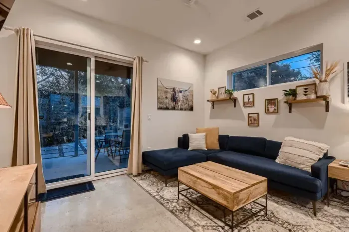 Modern living room with sleek furniture and a minimalist vibe.