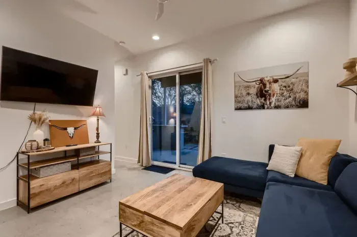 Modern living room with sleek furniture and a minimalist vibe.