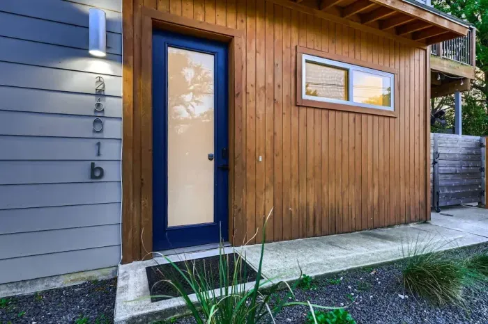 1. Welcoming home with an inviting front door and a beautiful garden path.