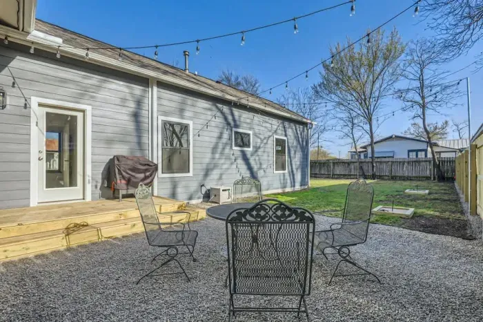Spacious and beautifully landscaped backyard, ideal for gatherings or quiet relaxation.