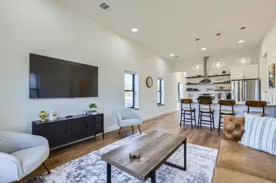 Equipped with a large TV, cozy seating, and space for everyone.