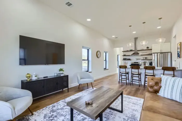 Equipped with a large TV, cozy seating, and space for everyone.