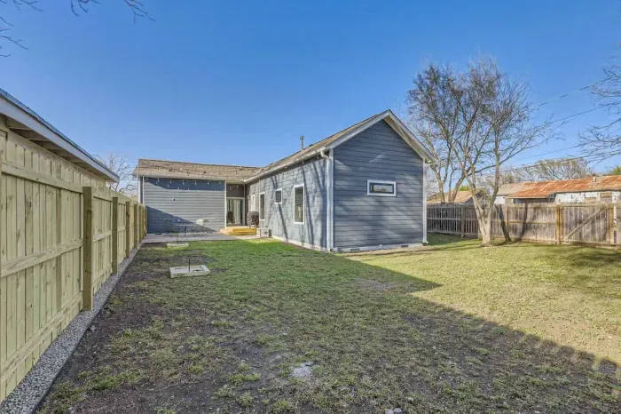 Spacious and beautifully landscaped backyard, ideal for gatherings or quiet relaxation.