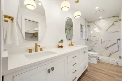 Relax in the luxurious primary bathroom featuring a spacious walk-in shower. With sleek finishes and modern design, this spa-like retreat offers both style and comfort, creating the perfect place to unwind and refresh after a long day.