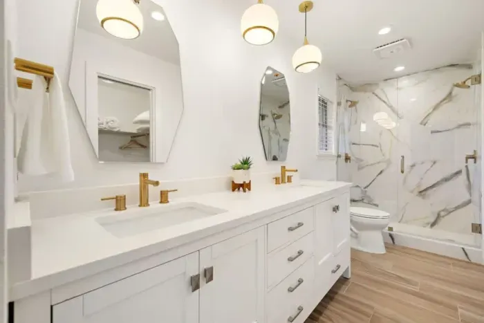 Relax in the luxurious primary bathroom featuring a spacious walk-in shower. With sleek finishes and modern design, this spa-like retreat offers both style and comfort, creating the perfect place to unwind and refresh after a long day.
